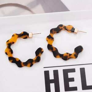 Wavy Resin Hoop Earrings in Dark Brown Tortoiseshell from BaubleBar